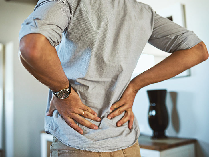 man with chronic back pain, belfast